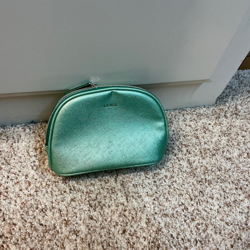 La Mer green new small makeup bag